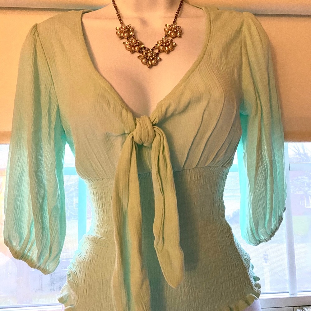 mint green blouse